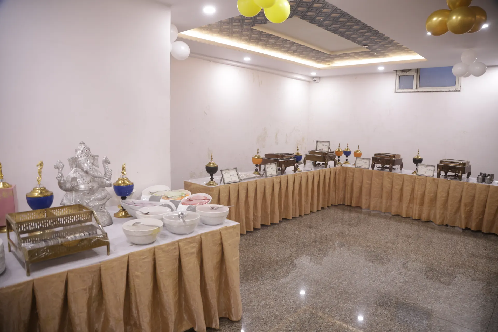 Buffet counters set up inside the banquet hall