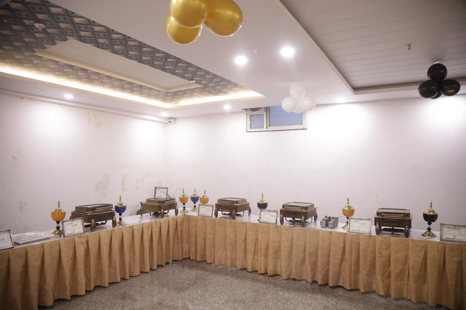 Buffet counters arranged along the banquet hall