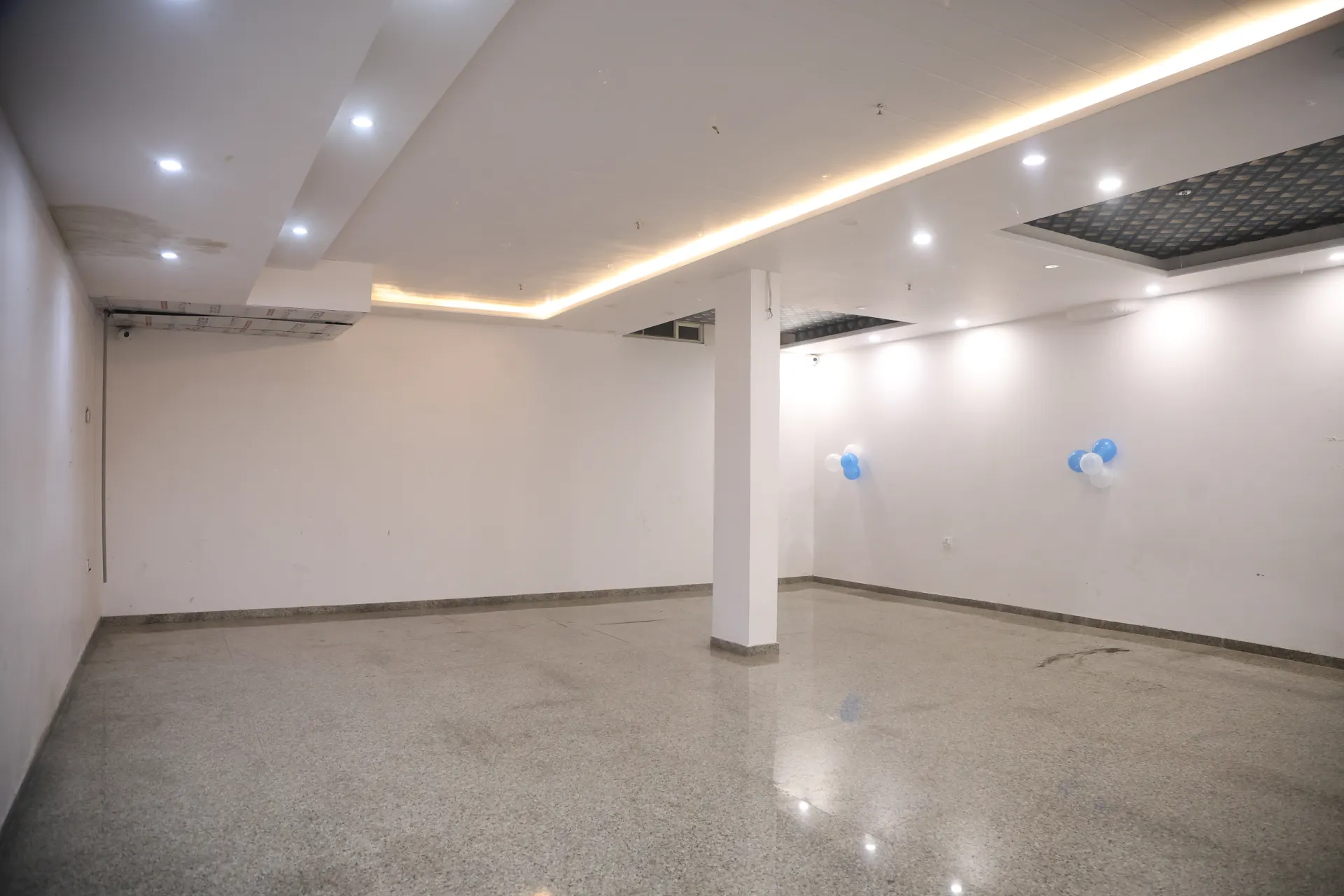 Bright air-conditioned banquet hall with ceiling cove lighting