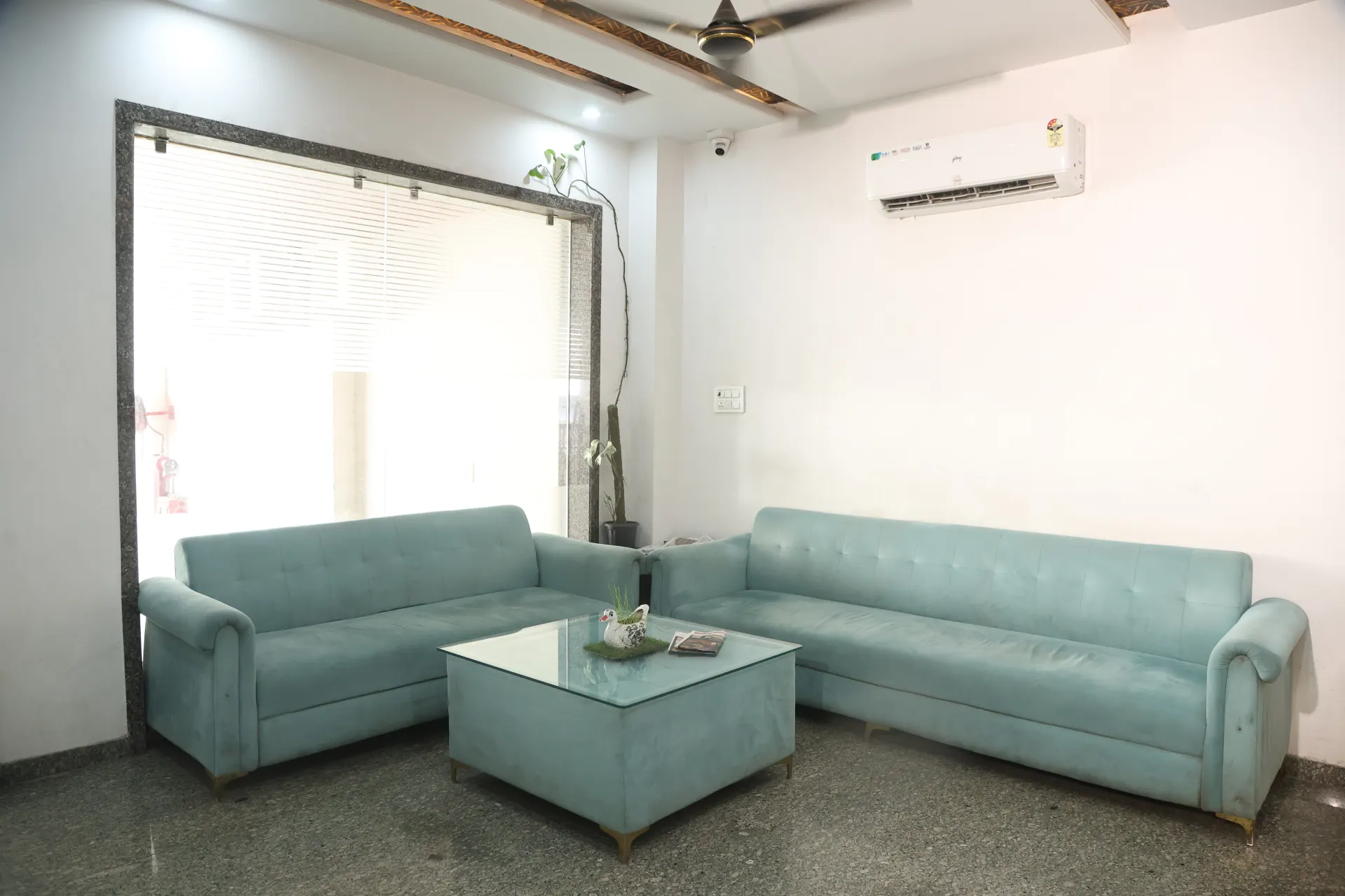 Teal sofas in the lobby lounge